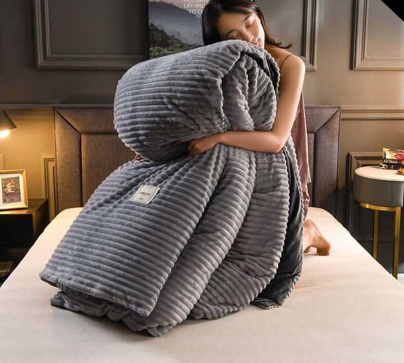 SnuggleLux™ O pătură caldă